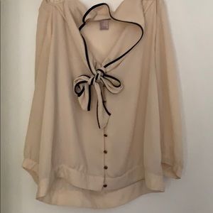 White blouse with navy trim